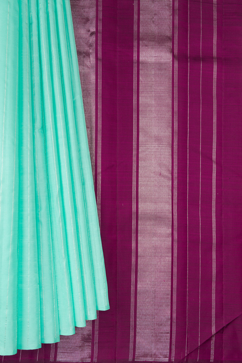 Pleats and pallu of Sea Green Dual Tone Kanjivaram Silk Saree with Stripes on the body and Without Border. 