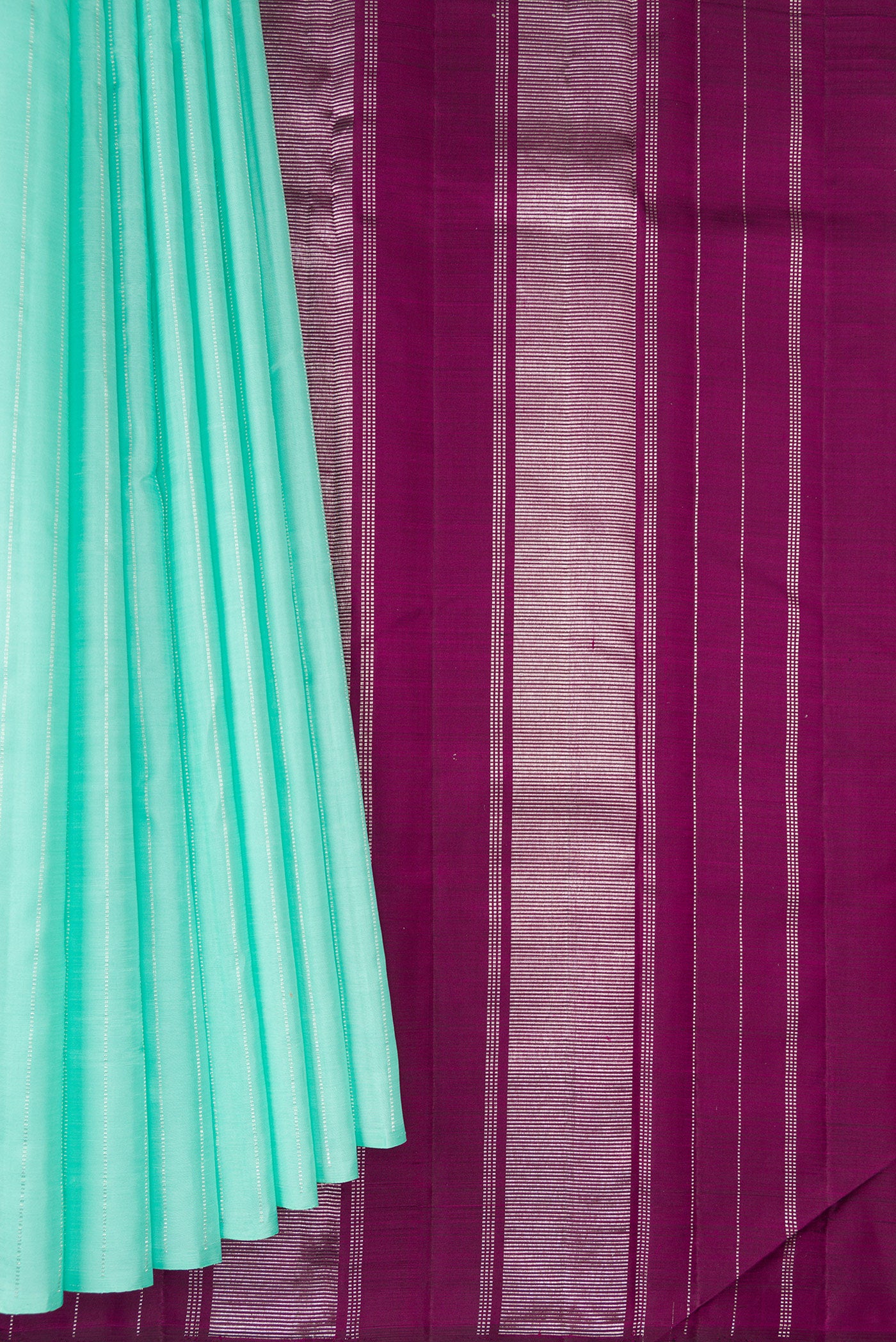 Pleats and pallu of Sea Green Dual Tone Kanjivaram Silk Saree with Stripes on the body and Without Border. 