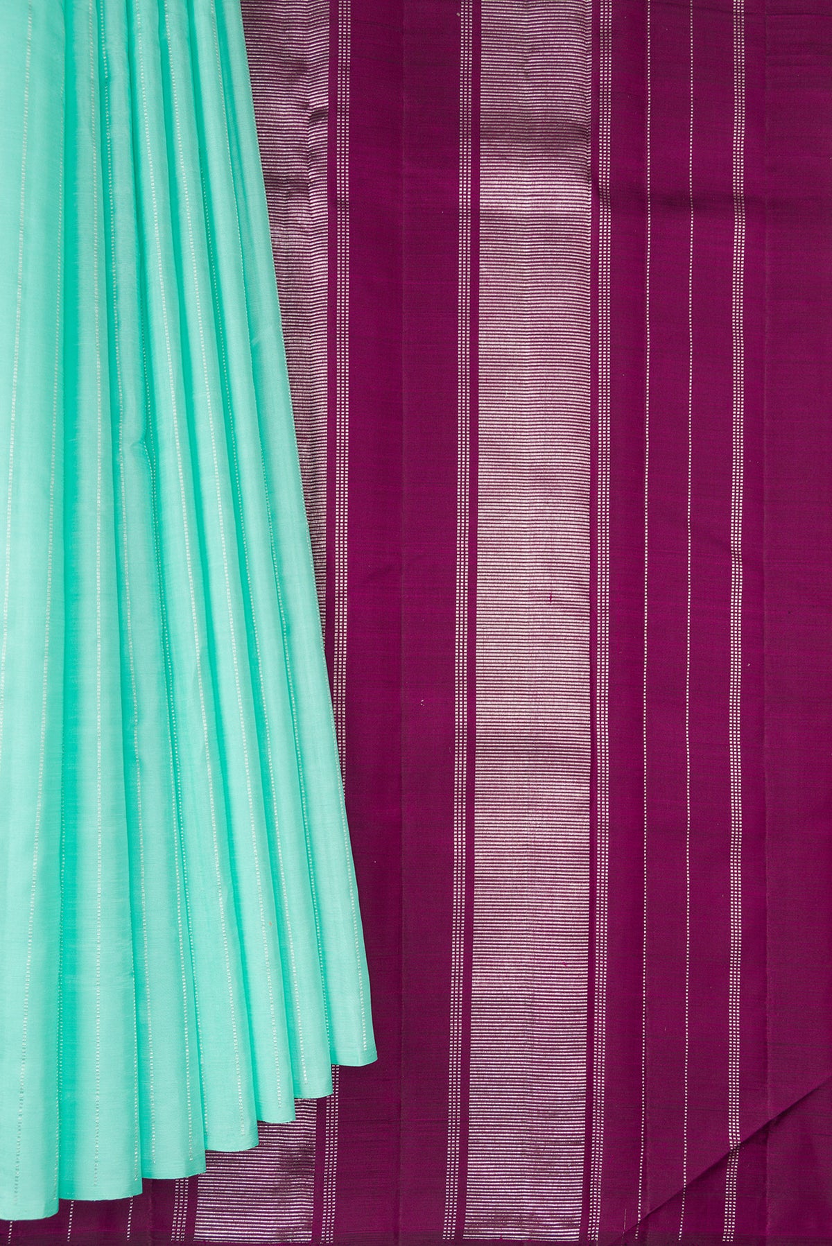 Pleats and pallu of Sea Green Dual Tone Kanjivaram Silk Saree with Stripes on the body and Without Border. 