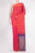 Pure Silk Coral Dual Tone Kanchipuram Saree with Zari Butta on the body and Without Border.  displayed on a mannequin