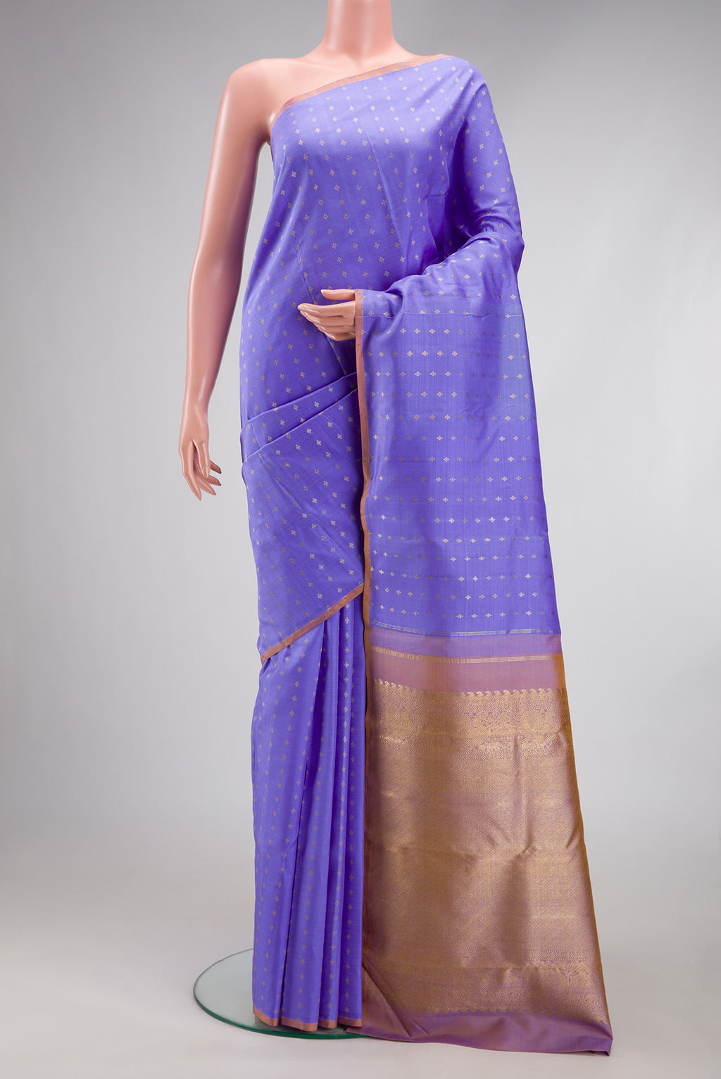 Lavender Kanchipuram Silk Saree with Zari Butta on the body and Without Border.  displayed on a mannequin