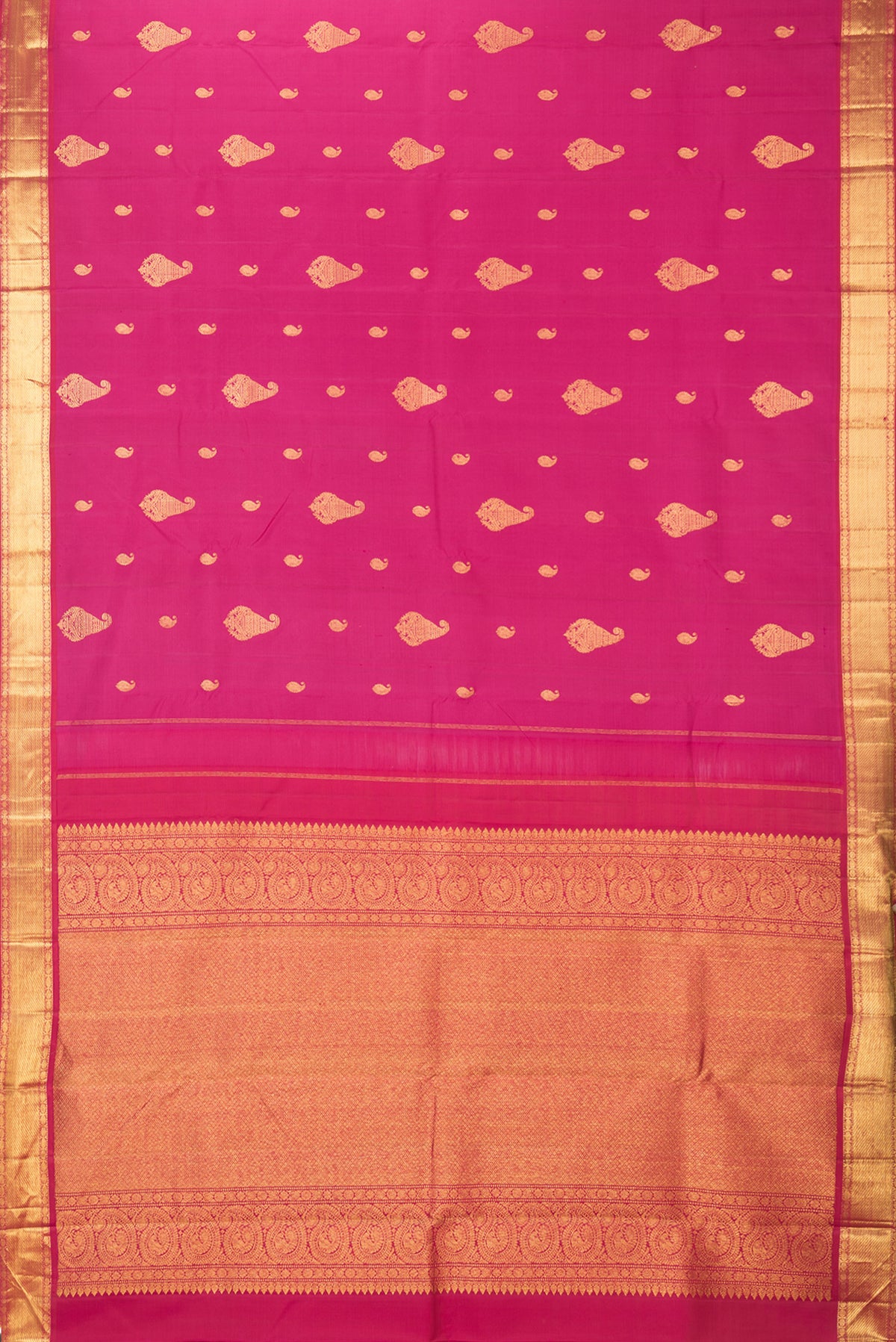 Flat view of Pure Silk Pink Kanjivaram Saree with Zari Butta on the body and Zari Border. 