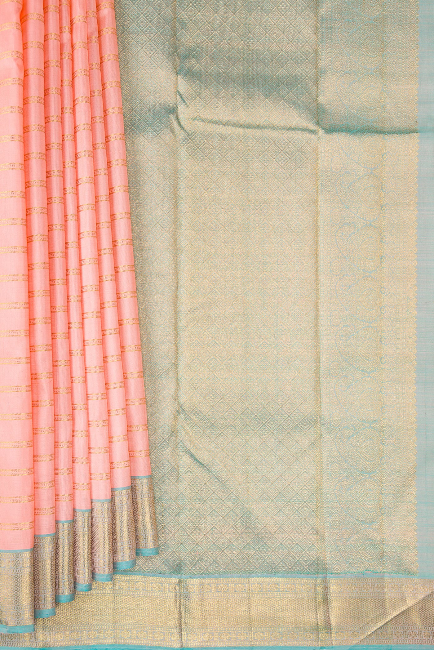 Pleats and pallu of Peach Kanjivaram Silk Saree with Stripes on the body and Zari Border. 