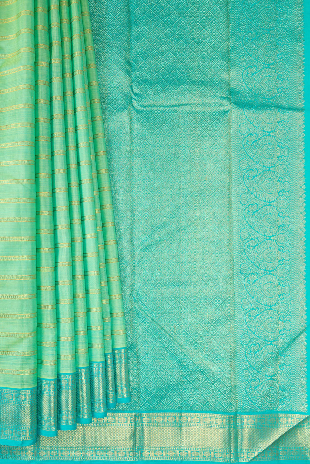 Pleats and pallu of Pista Green Kanjivaram Silk Saree with Stripes on the body and Zari Border. 