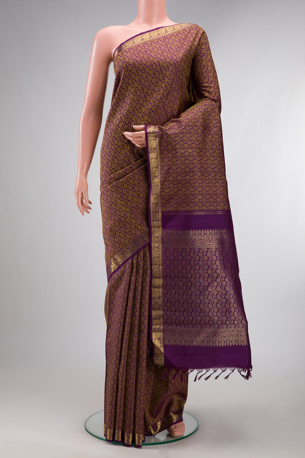 Pure Silk Purple Kanchipuram Saree with Jacquard design on the body and Zari Border.  displayed on a mannequin