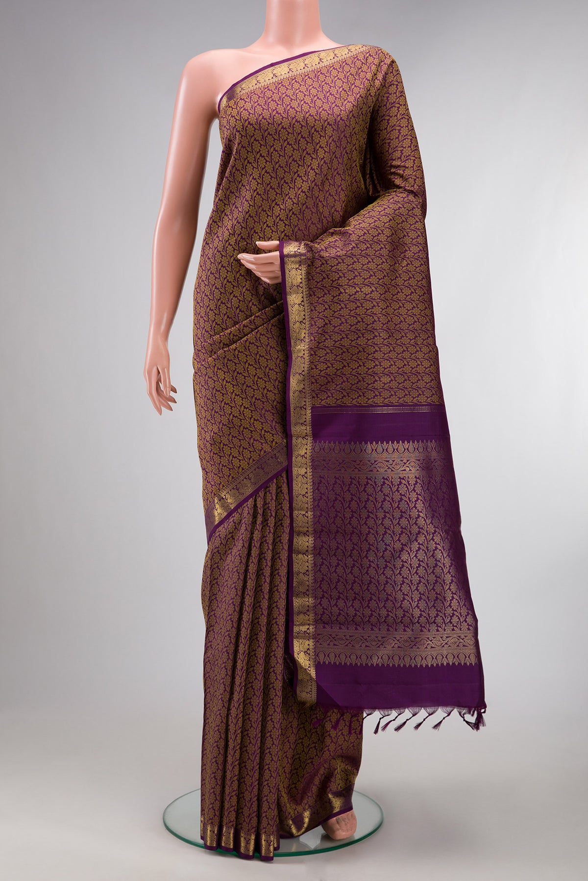 Pure Silk Purple Kanchipuram Saree with Jacquard design on the body and Zari Border.  displayed on a mannequin
