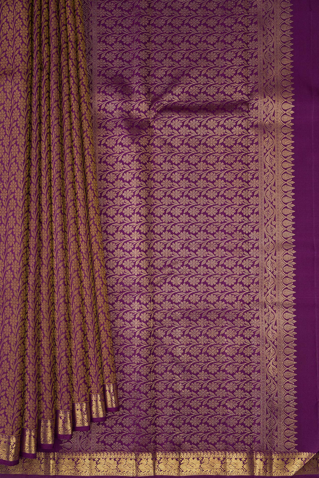 Pleats and pallu of Pure Silk Purple Kanchipuram Saree with Jacquard design on the body and Zari Border. 