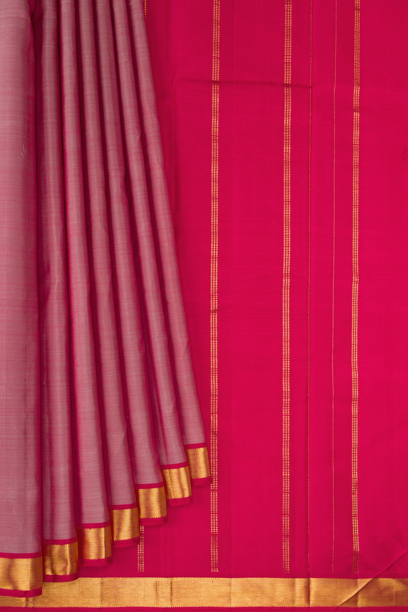 Pleats and pallu of Rose Gold Kanjivaram Silk Saree with Plain Body and Zari Border. 