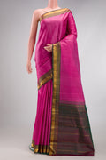 Pink Kanjivaram Silk Saree with Plain Body and Zari Border.  displayed on a mannequin