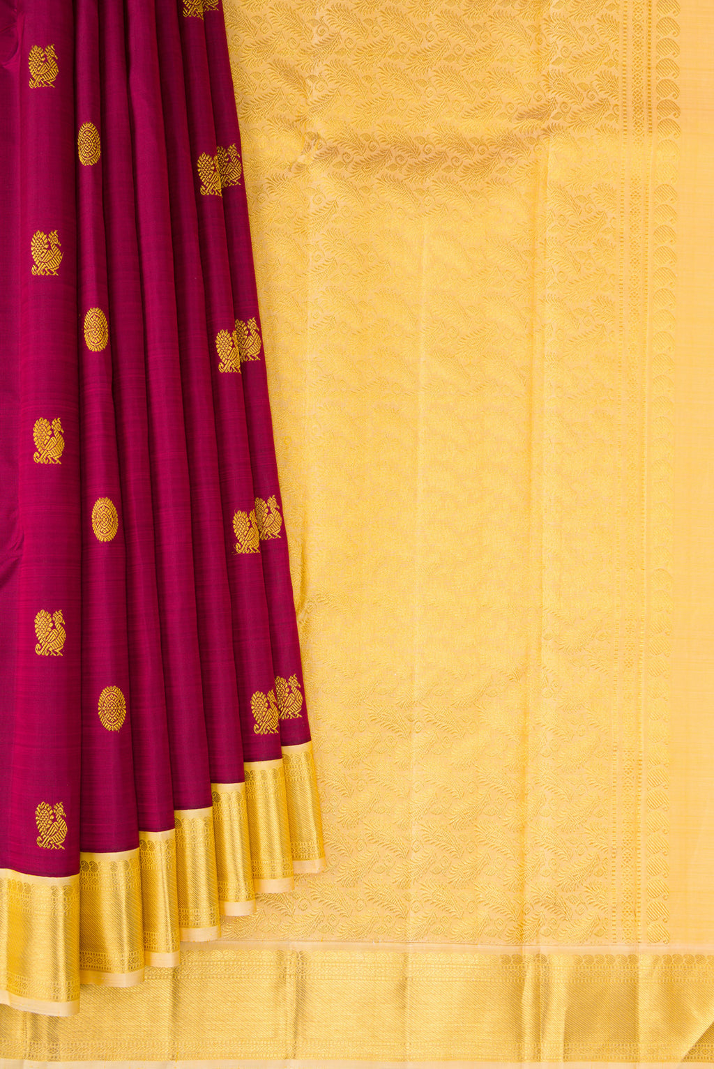 Pleats and pallu of Magenta Kanjivaram Silk Saree with Zari Butta on the body and Zari Border. 