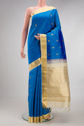 Royal Blue Kanjivaram Silk Saree with Zari Butta on the body and Zari Border.  displayed on a mannequin