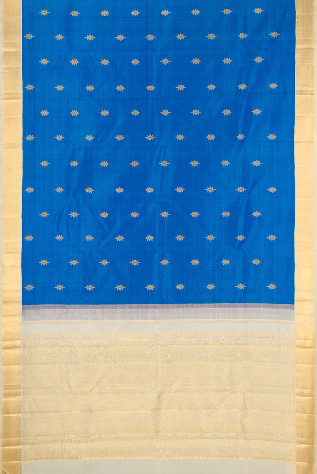 Flat view of Royal Blue Kanjivaram Silk Saree with Zari Butta on the body and Zari Border. 