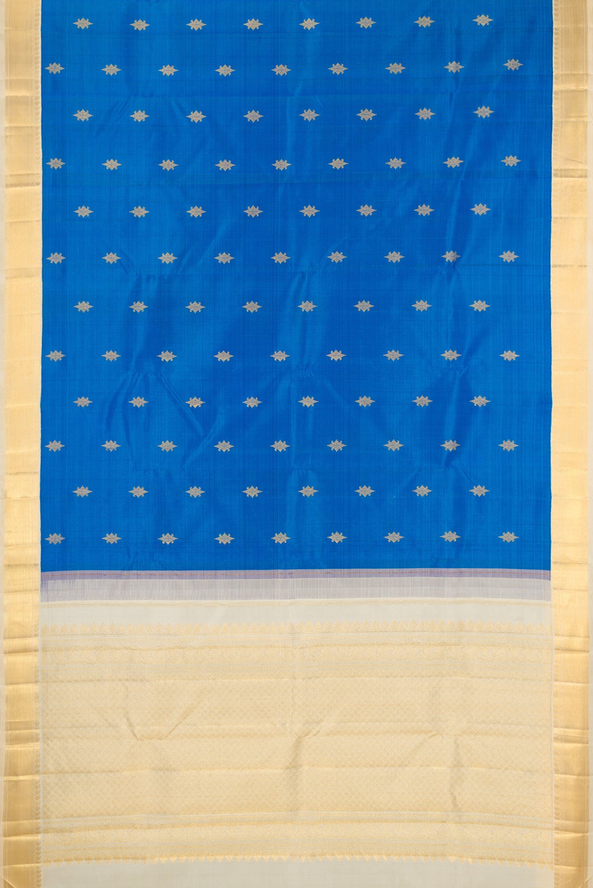 Flat view of Royal Blue Kanjivaram Silk Saree with Zari Butta on the body and Zari Border. 