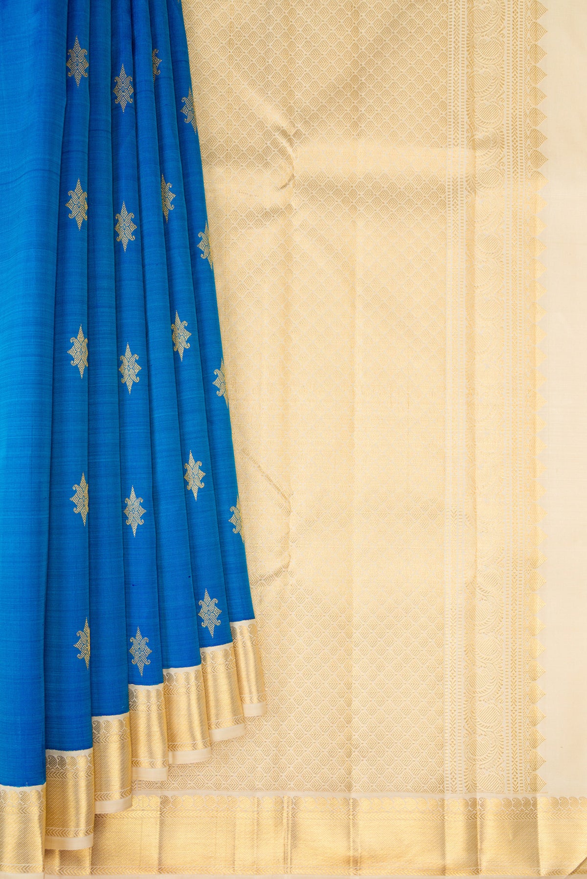 Pleats and pallu of Royal Blue Kanjivaram Silk Saree with Zari Butta on the body and Zari Border. 