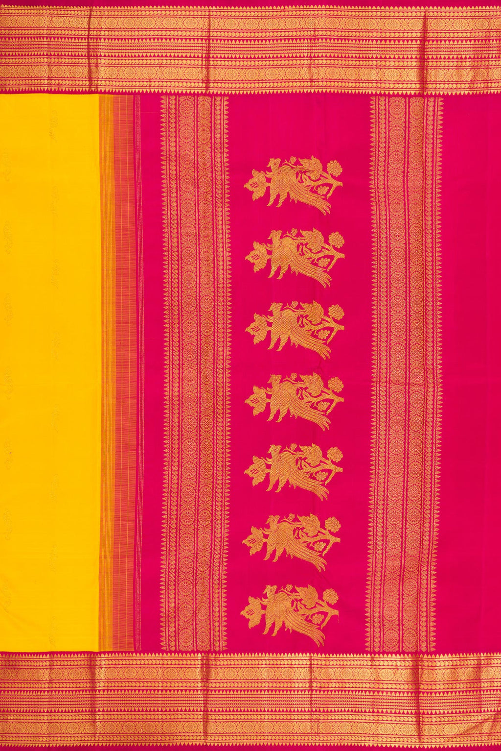 Close up image of the pallu of Yellow Kanjivaram Silk Saree with Zari Butta on the body and Zari Border. 