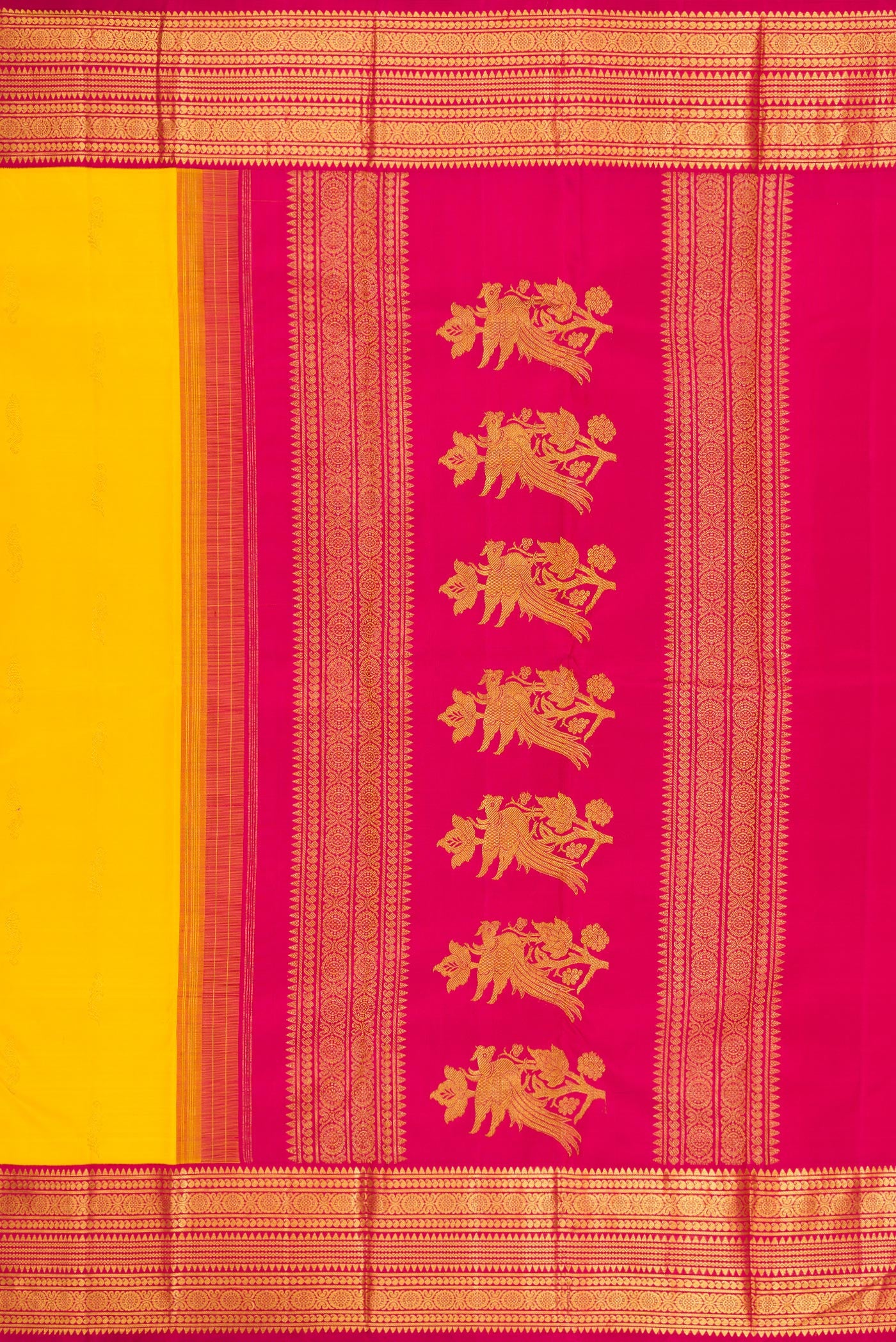 Close up image of the pallu of Yellow Kanjivaram Silk Saree with Zari Butta on the body and Zari Border. 