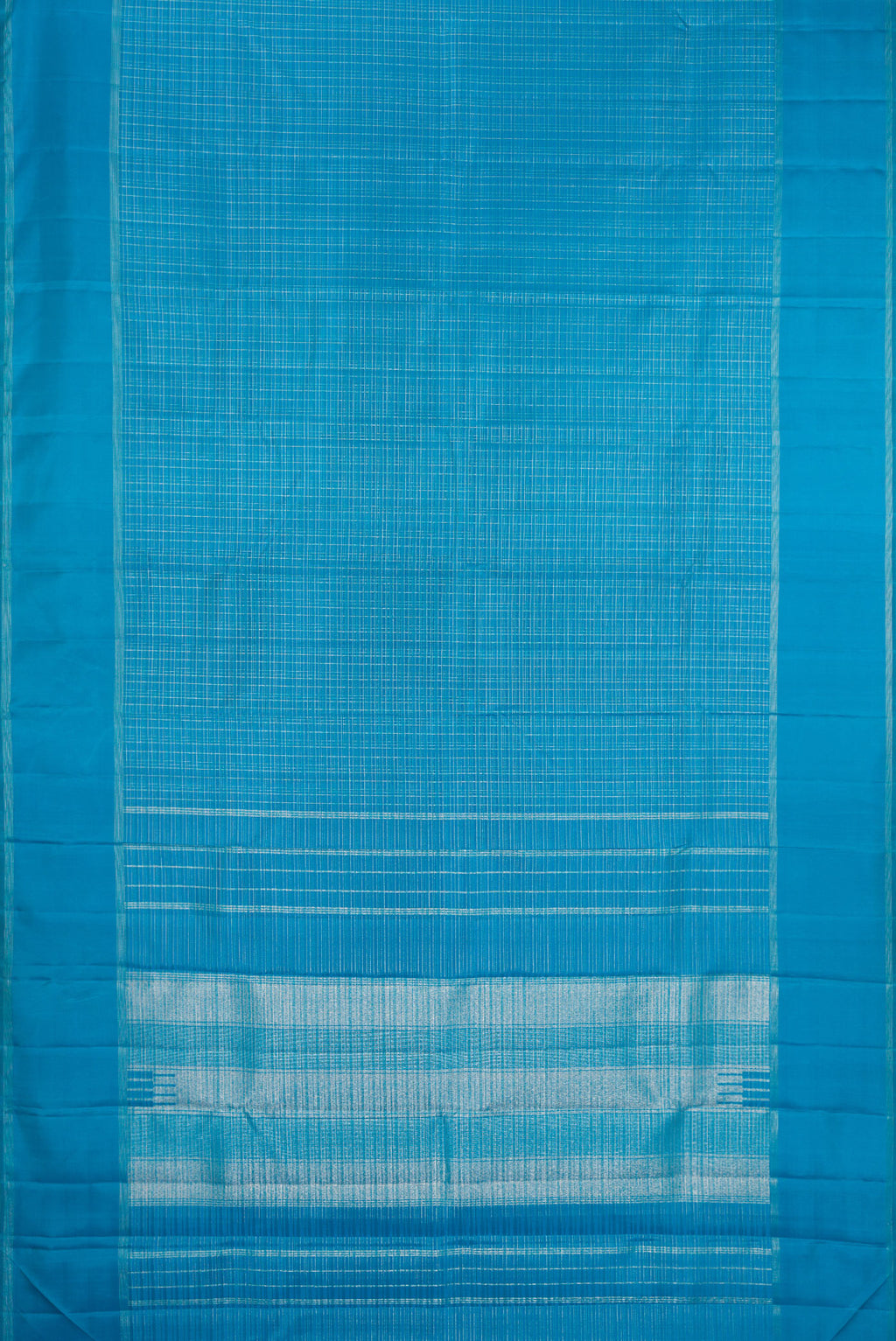 Flat view of Sky Blue Kanchipuram Silk Saree with Checked design on the body and Zari Border. 
