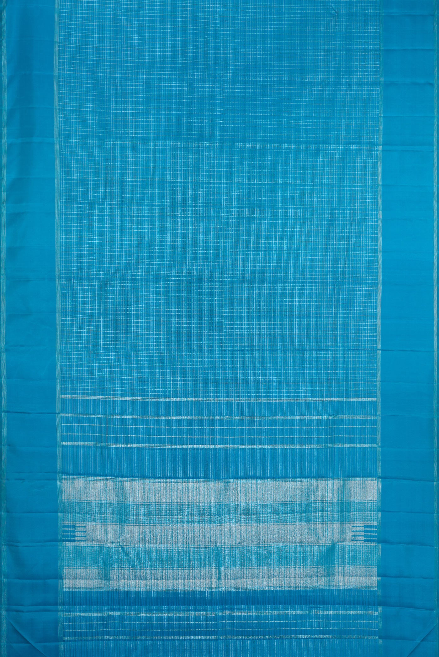 Flat view of Sky Blue Kanchipuram Silk Saree with Checked design on the body and Zari Border. 
