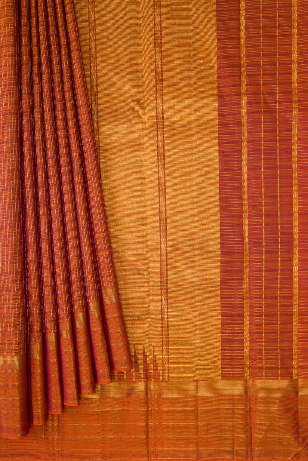 Pleats and pallu of Brick Orange Kanchipuram Silk Saree with Checked design on the body and Zari Border. 