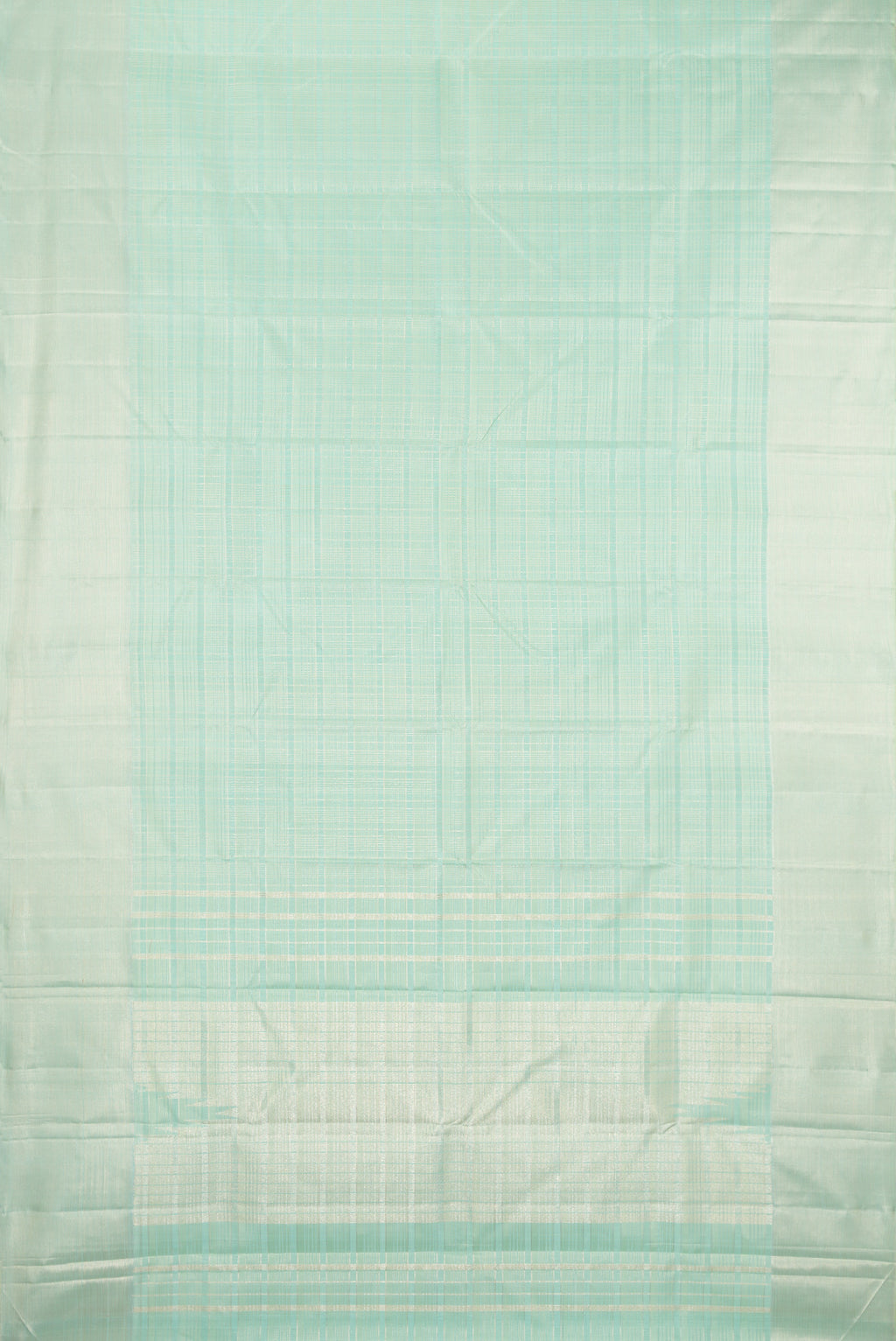 Flat view of Mint Green Kanjivaram Silk Saree with Checked design on the body and Zari Border. 