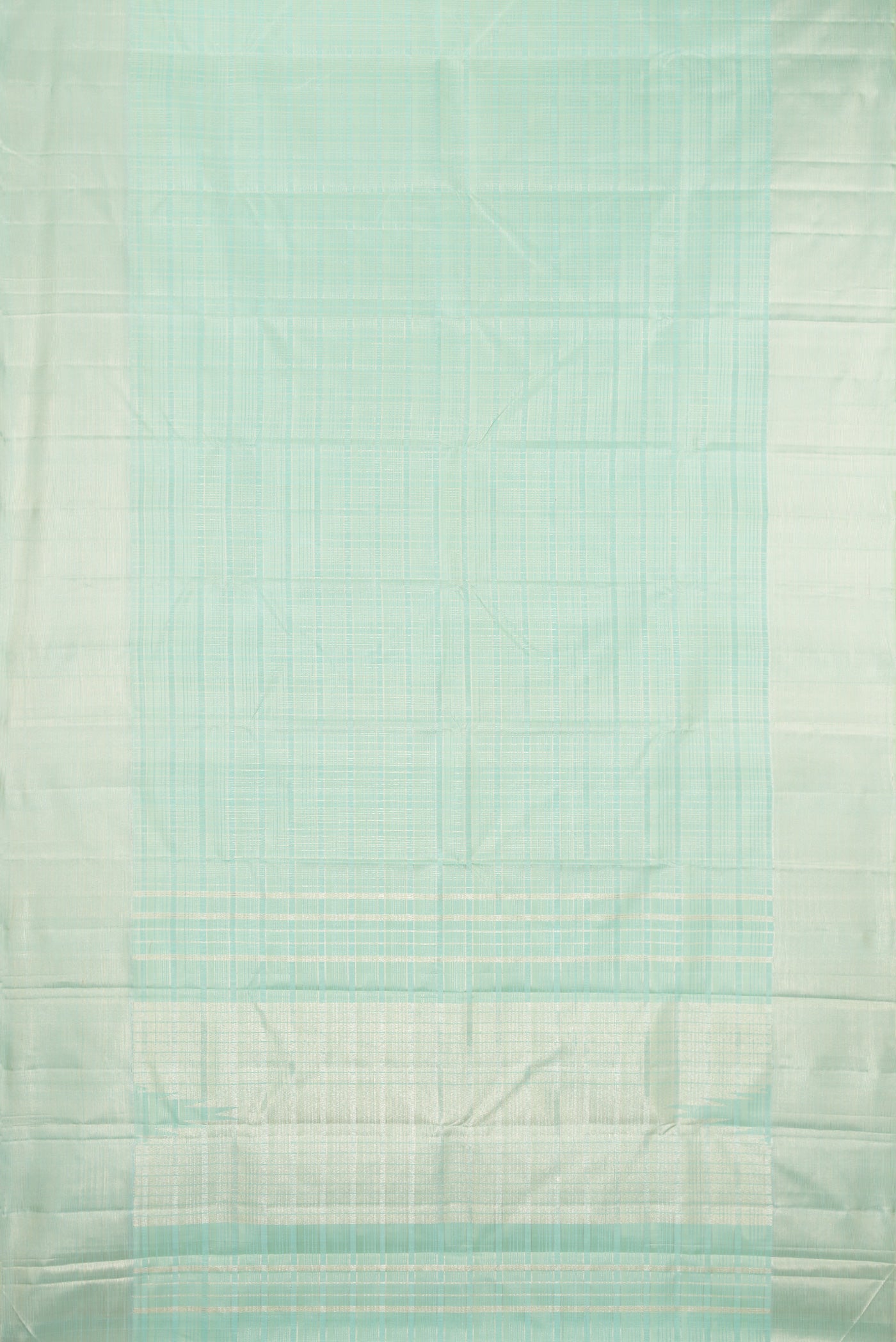 Flat view of Mint Green Kanjivaram Silk Saree with Checked design on the body and Zari Border. 