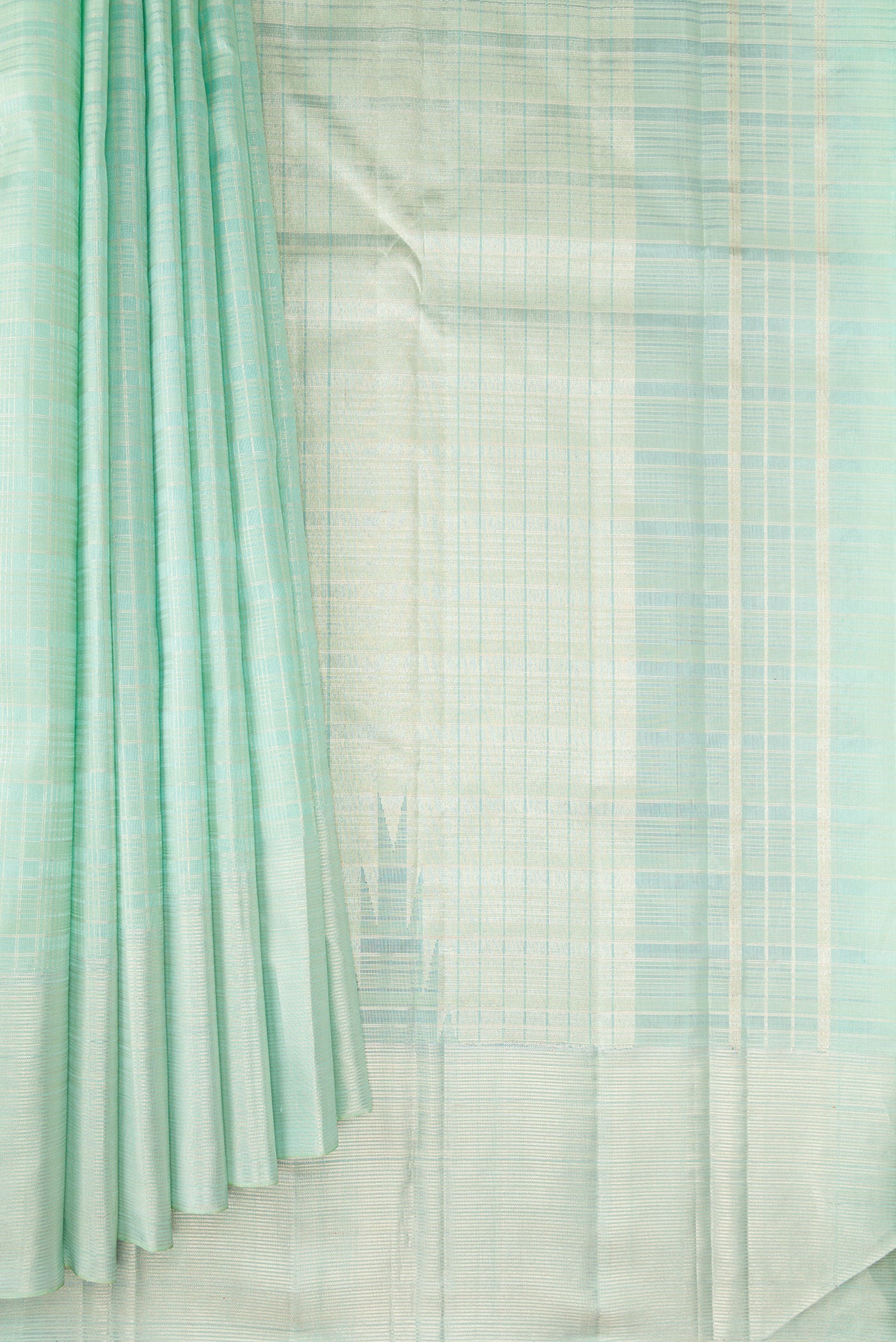 Pleats and pallu of Mint Green Kanjivaram Silk Saree with Checked design on the body and Zari Border. 