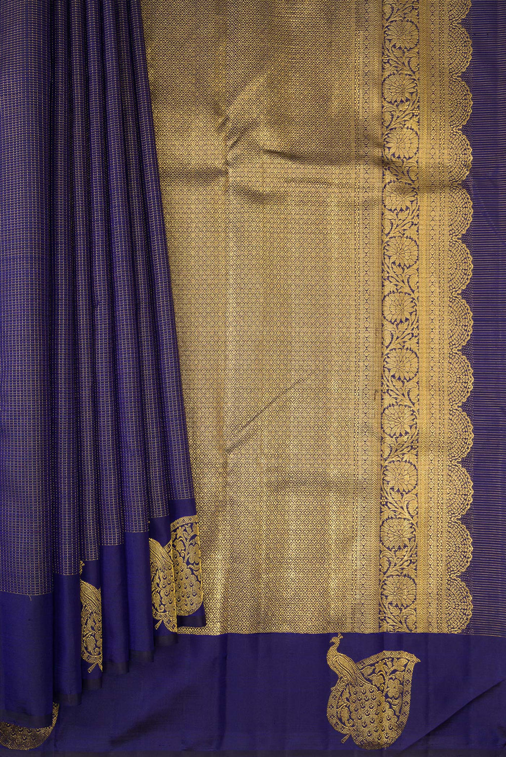 Pleats and pallu of Pure Silk Navy Blue Kanjivaram Saree with Checked design on the body and Fancy Border. 