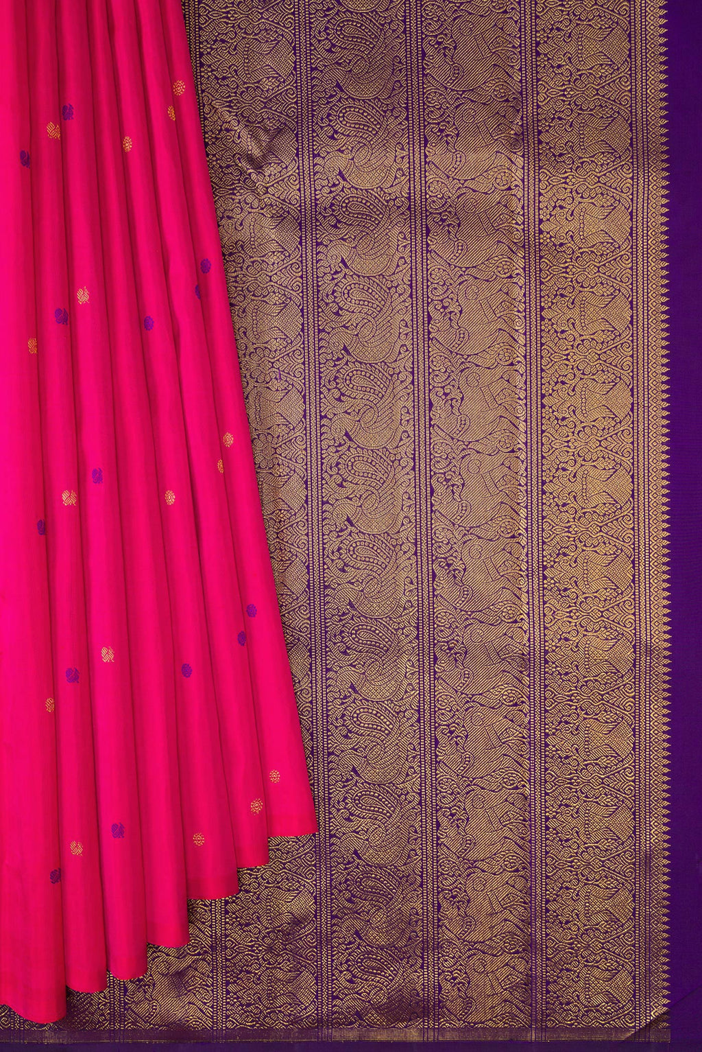 Pleats and pallu of Pink Kanjivaram Silk Saree with Zari And Thread Butta on the body and Without Border. 