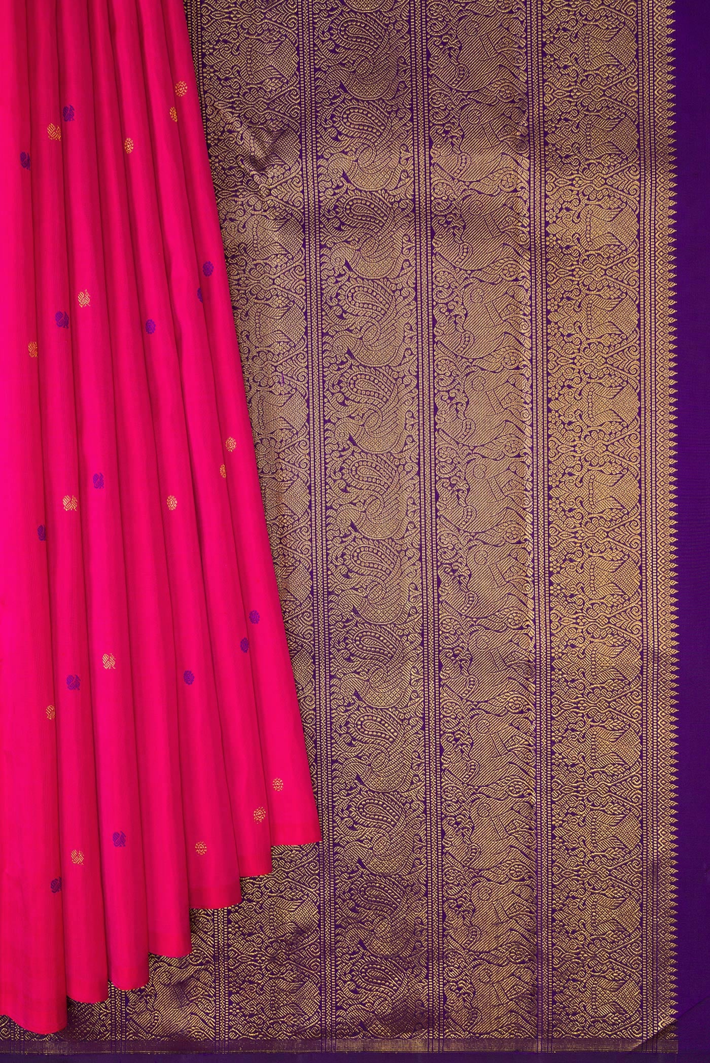 Pleats and pallu of Pink Kanjivaram Silk Saree with Zari And Thread Butta on the body and Without Border. 
