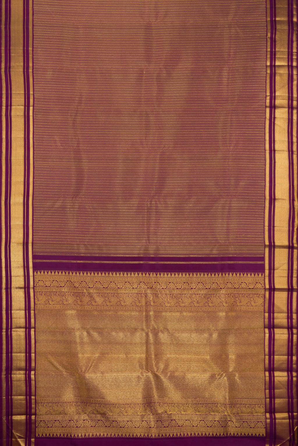 Flat view of Pure Silk Purple Kanchipuram Saree with Jacquard design on the body and Zari Border. 
