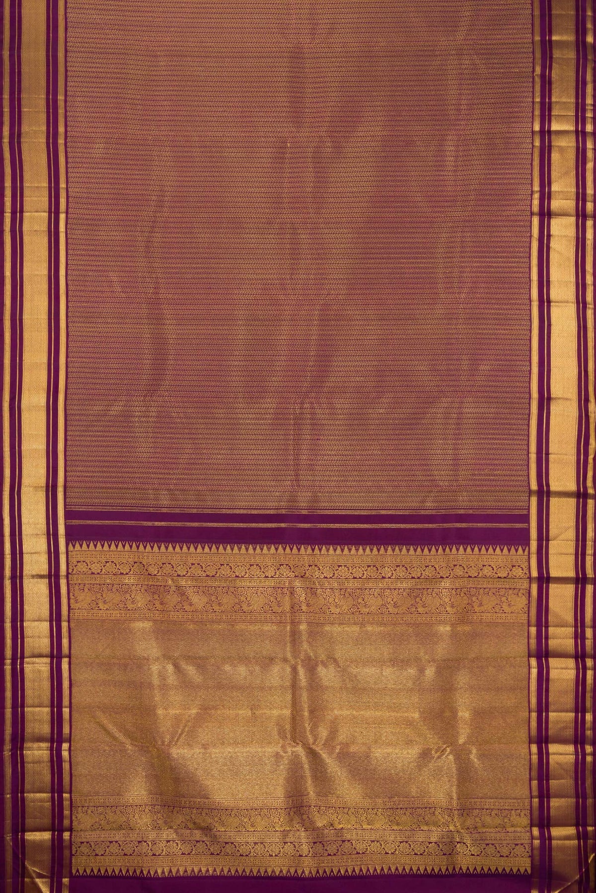 Flat view of Pure Silk Purple Kanchipuram Saree with Jacquard design on the body and Zari Border. 