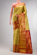 Pure Silk Gold Kanchipuram Saree with Zari Brocade on the body and Zari Border.  displayed on a mannequin