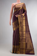 Pure Silk Burgundy Dual Tone Kanjivaram Saree with Stripes on the body and Zari Border.  displayed on a mannequin