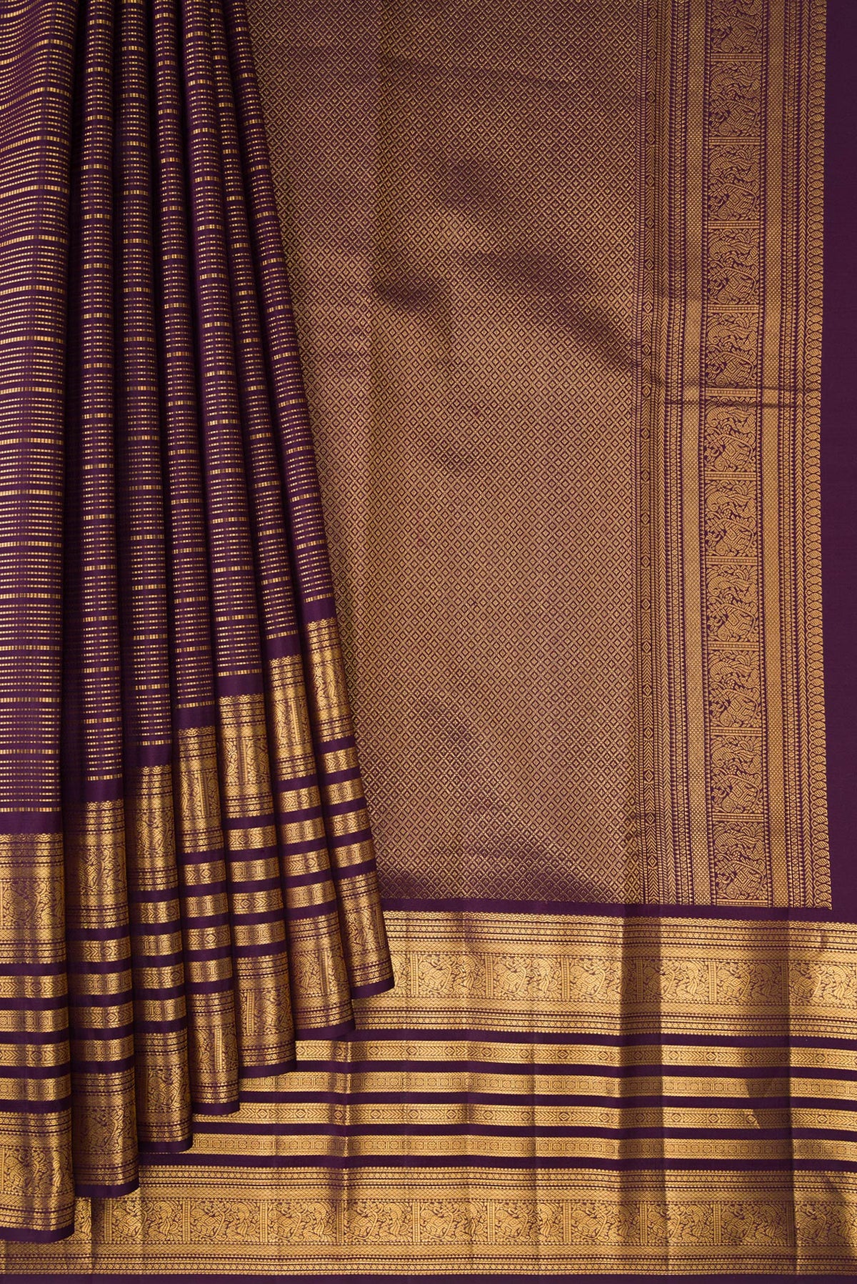 Pleats and pallu of Pure Silk Burgundy Dual Tone Kanjivaram Saree with Stripes on the body and Zari Border. 