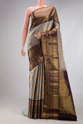 Grey Kanjivaram Silk Saree with Stripes on the body and Zari Border.  displayed on a mannequin
