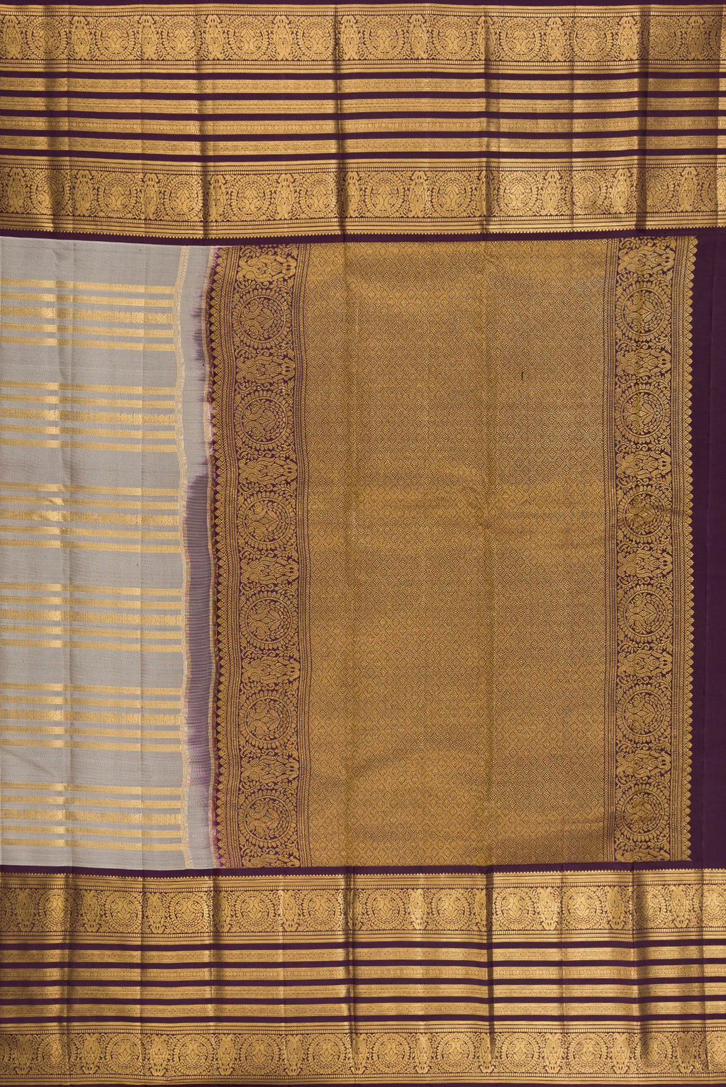 Close up image of the pallu of Grey Kanjivaram Silk Saree with Stripes on the body and Zari Border. 