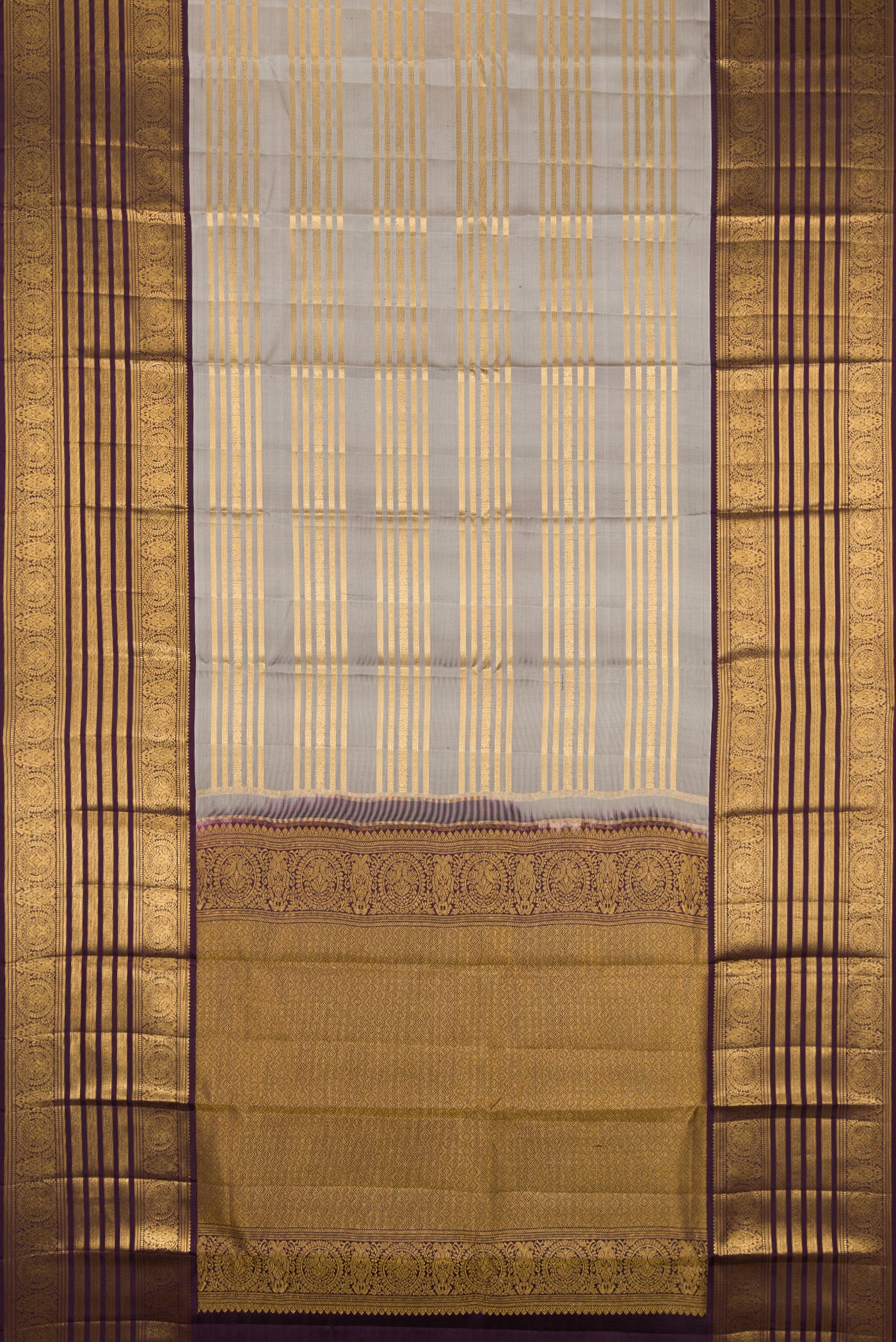 Flat view of Grey Kanjivaram Silk Saree with Stripes on the body and Zari Border. 