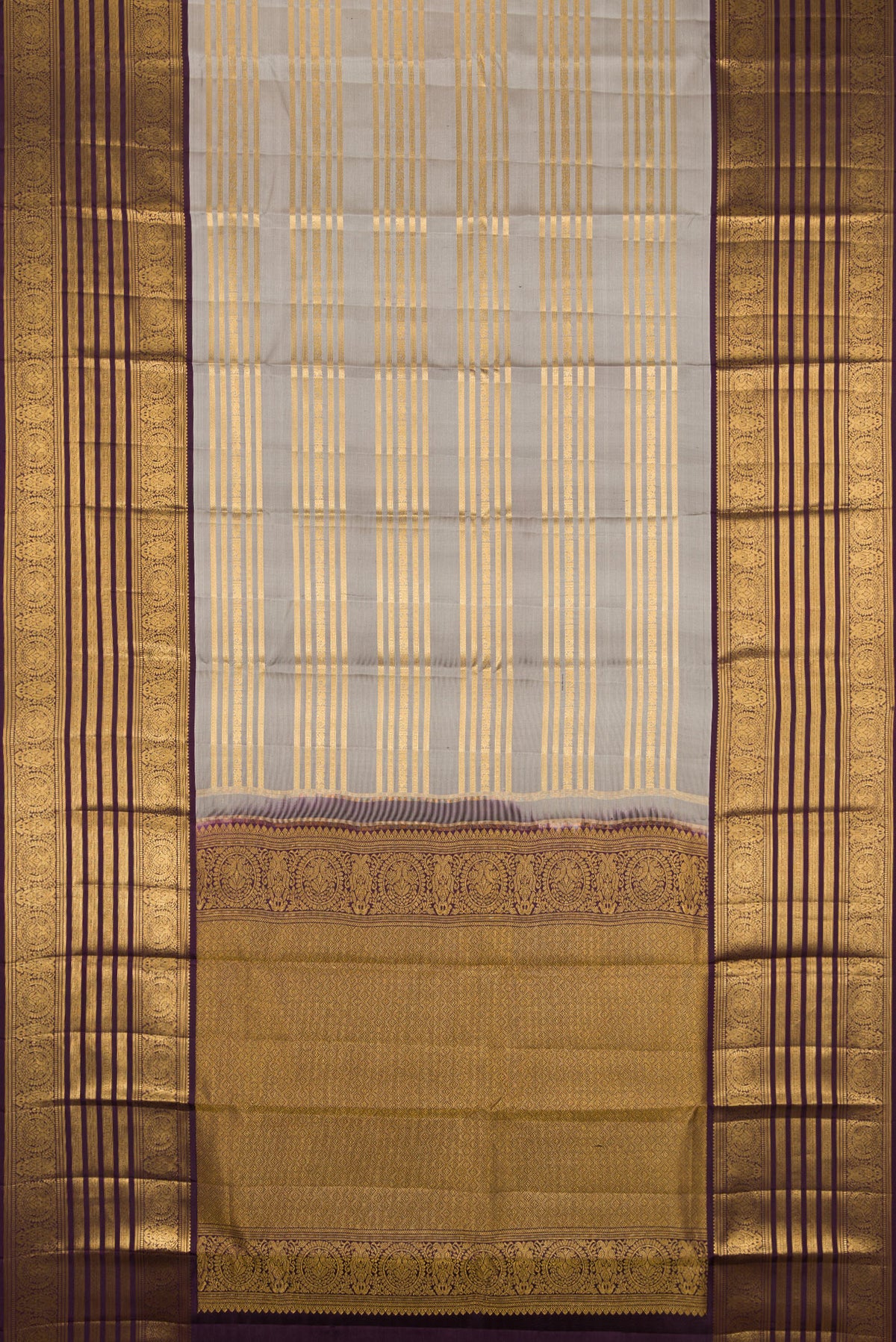 Flat view of Grey Kanjivaram Silk Saree with Stripes on the body and Zari Border. 
