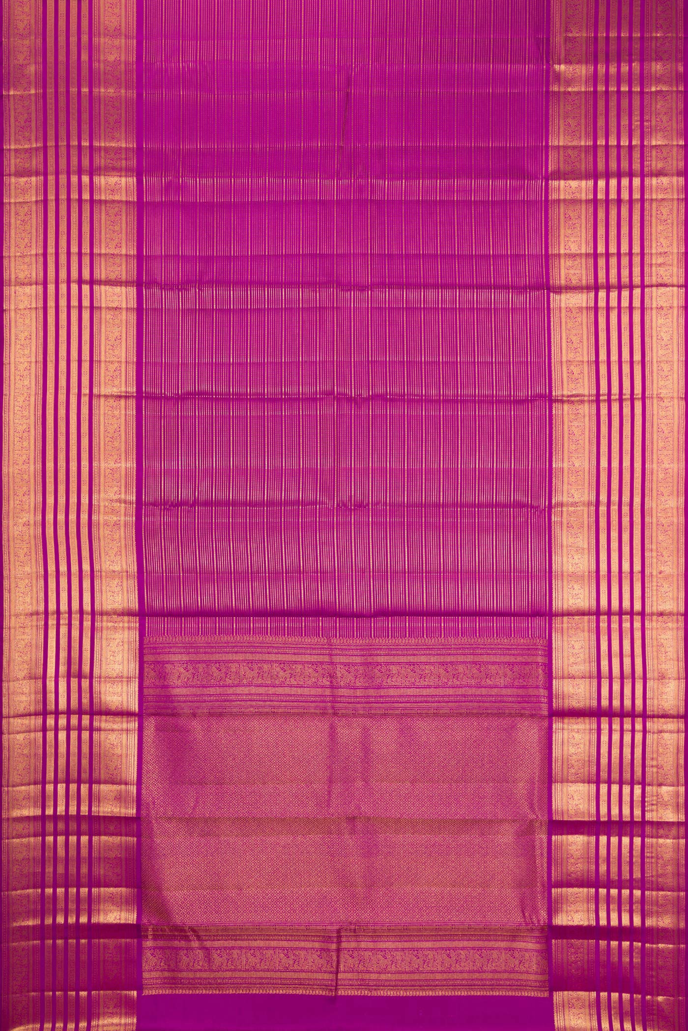Flat view of Magenta Kanjivaram Silk Saree with Stripes on the body and Fancy Border. 