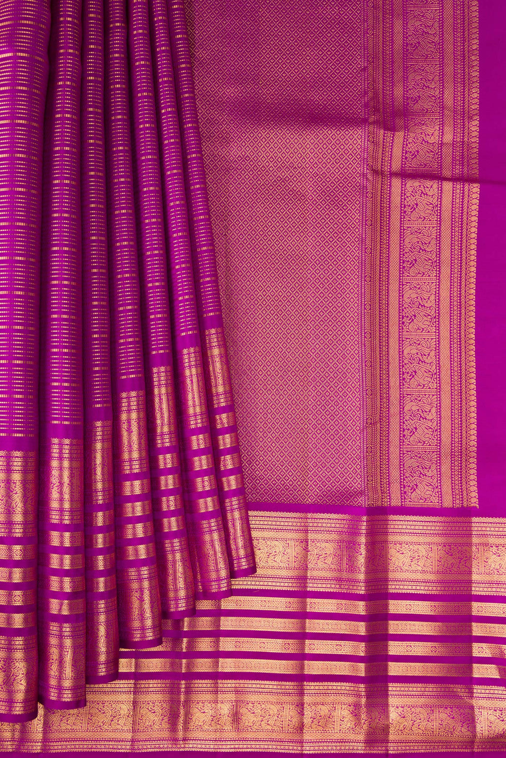 Pleats and pallu of Magenta Kanjivaram Silk Saree with Stripes on the body and Fancy Border. 
