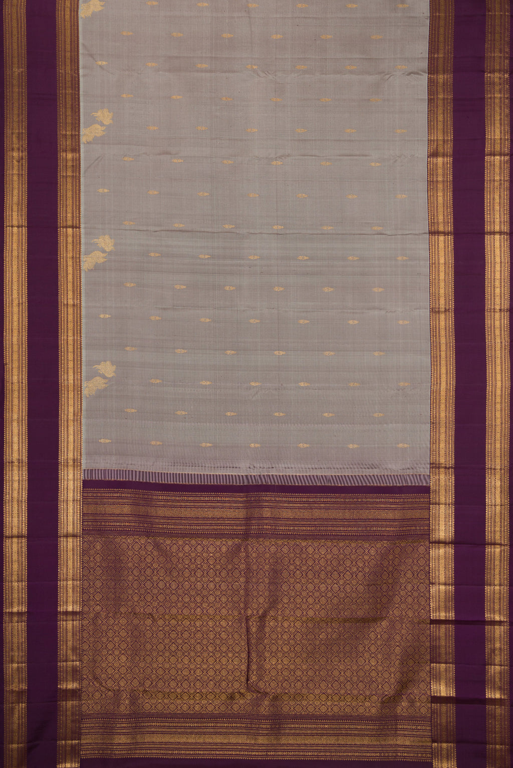 Flat view of Grey Kanjivaram Silk Saree with Zari Butta on the body and Zari Border. 