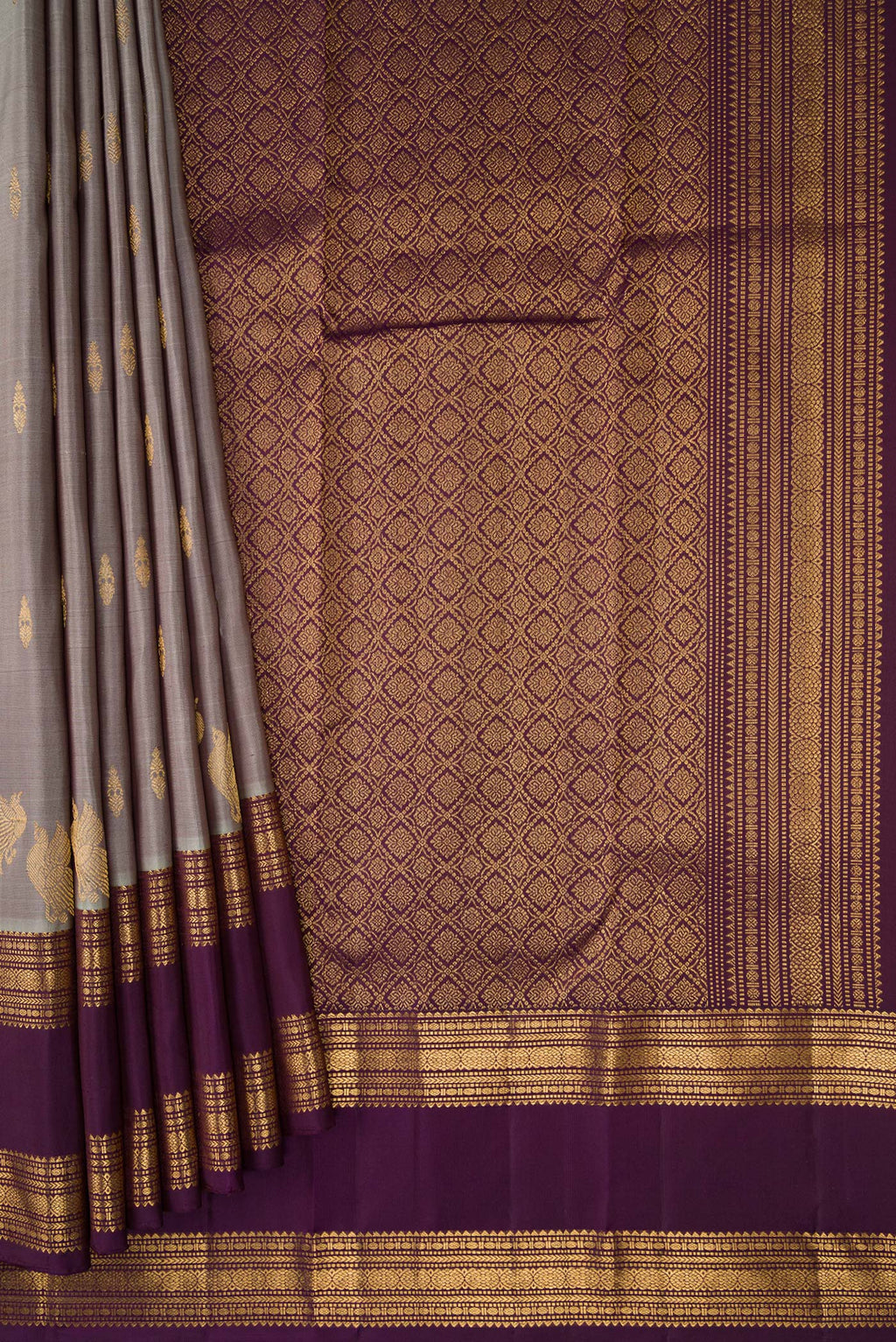 Pleats and pallu of Grey Kanjivaram Silk Saree with Zari Butta on the body and Zari Border. 