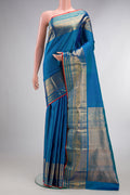 Pure Silk Blue Kanjivaram Saree with Zari Butta on the body and Zari Border.  displayed on a mannequin