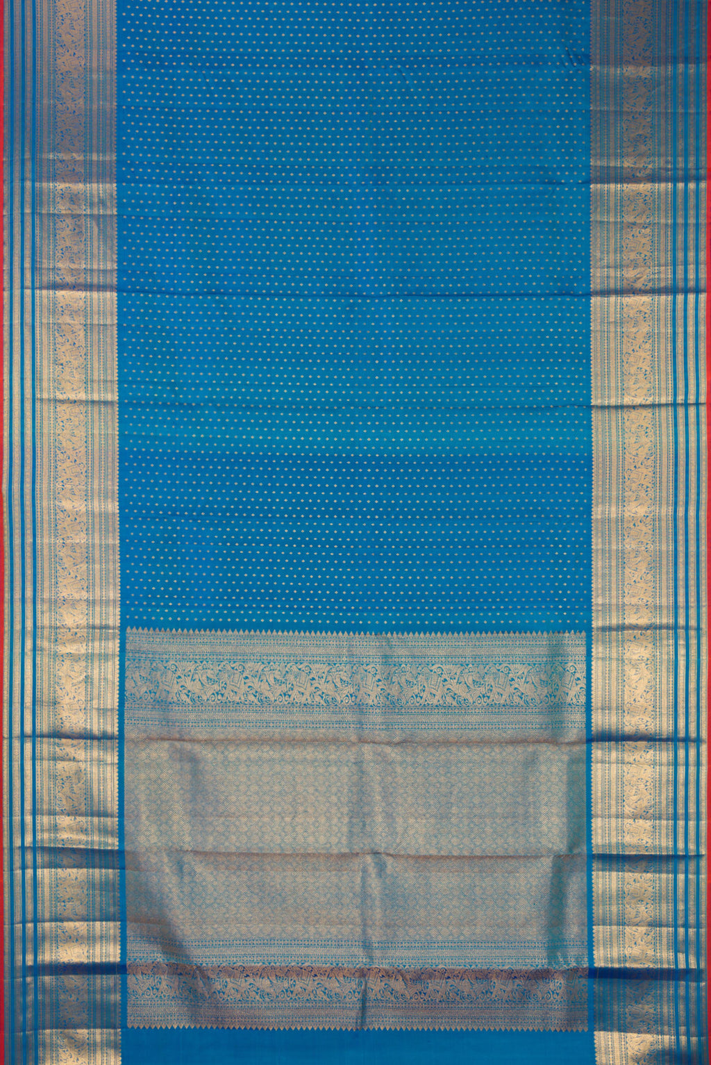 Flat view of Pure Silk Blue Kanjivaram Saree with Zari Butta on the body and Zari Border. 