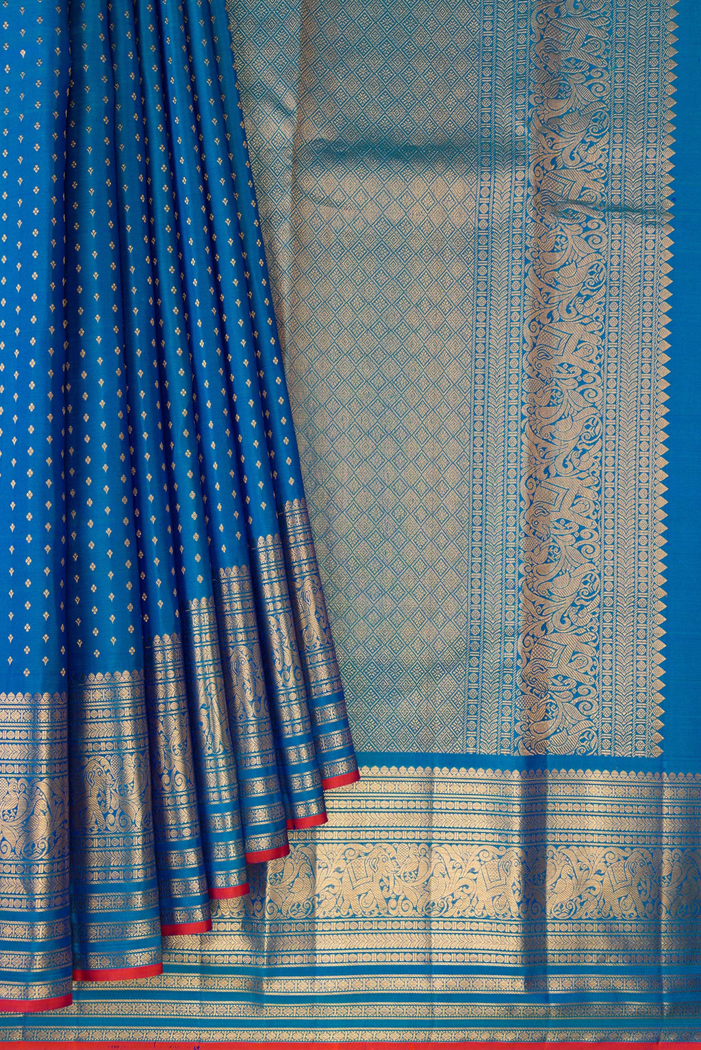 Pleats and pallu of Pure Silk Blue Kanjivaram Saree with Zari Butta on the body and Zari Border. 