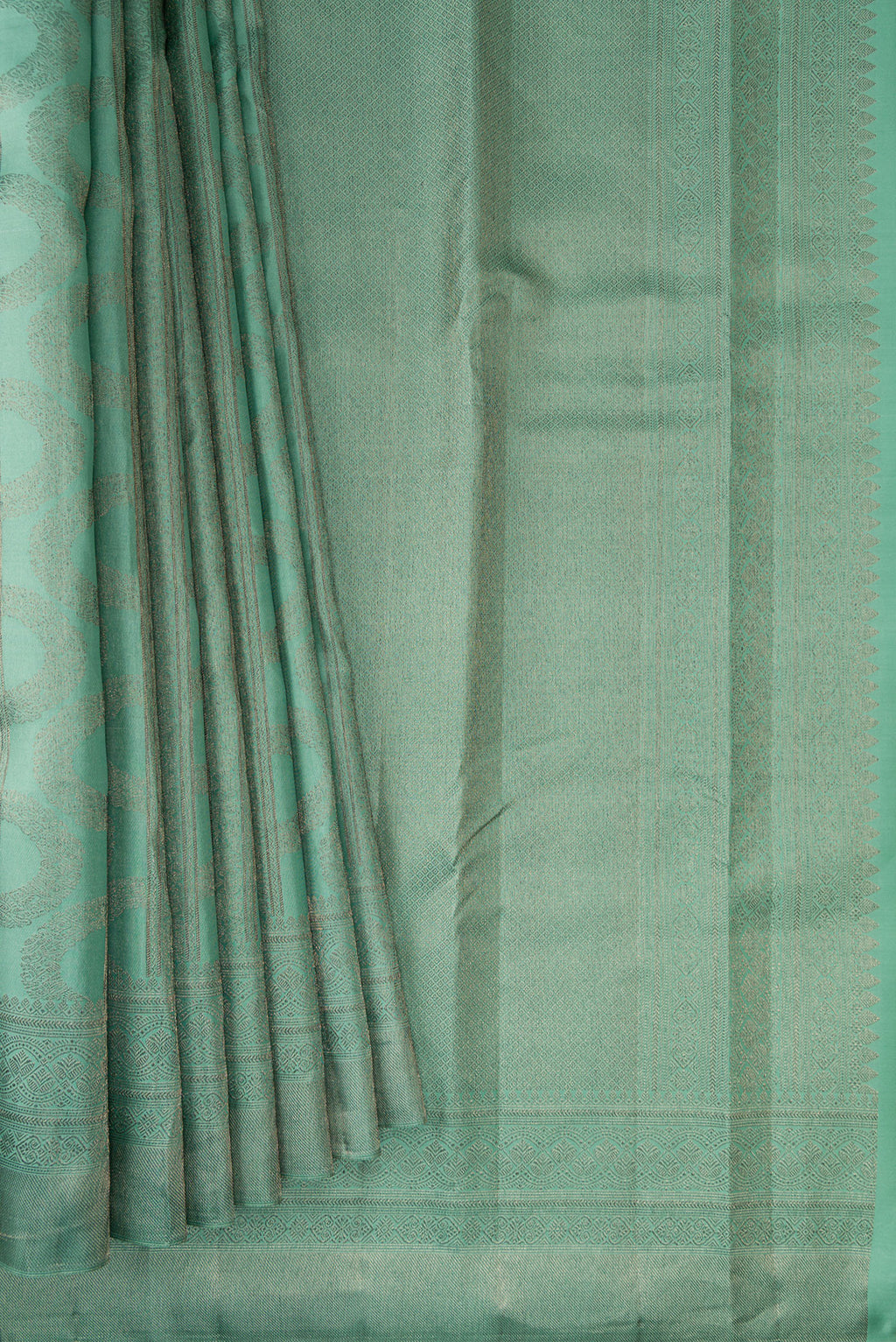 Pleats and pallu of Pure Silk Sea Green Kanjivaram Saree with Zari Brocade on the body and Fancy Border. 