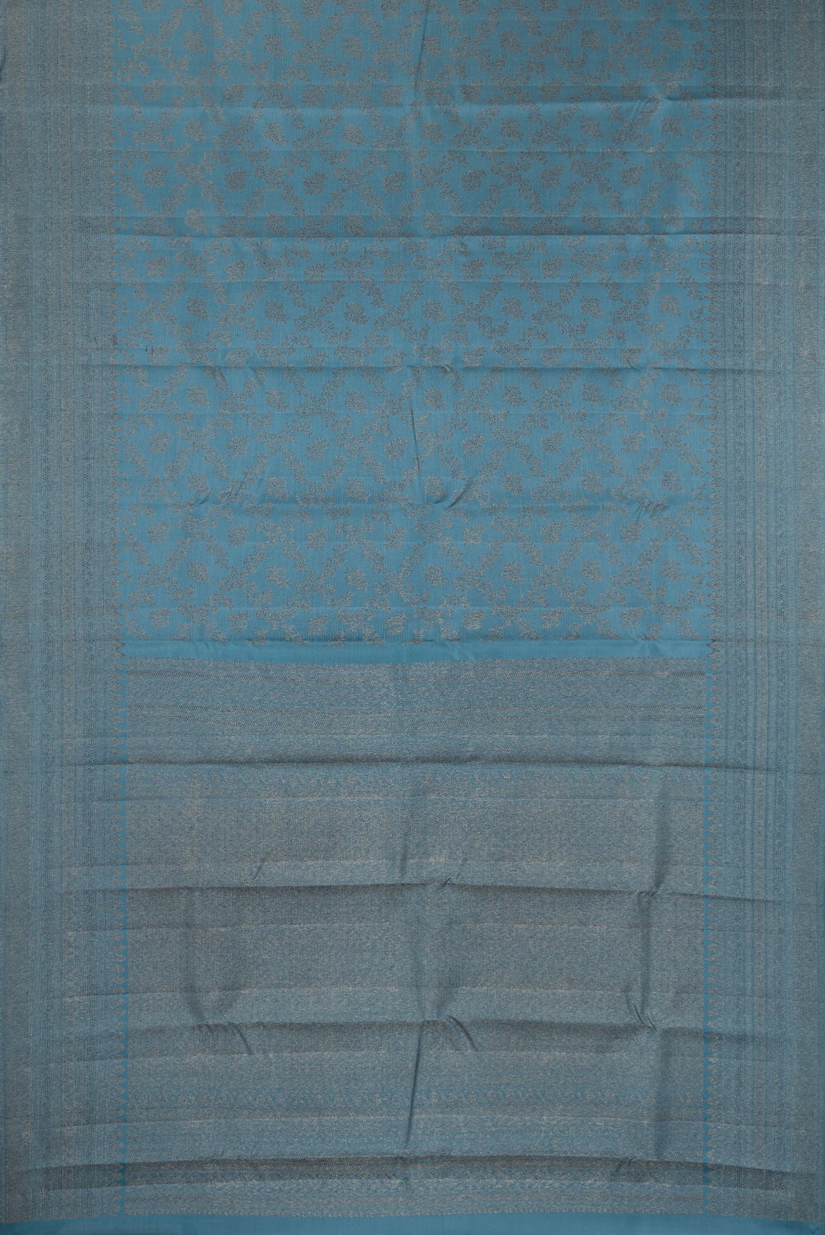 Flat view of Pure Silk Maya Blue Dual Tone Kanjivaram Saree with Zari Brocade on the body and Fancy Border. 