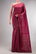 Pure Silk Dark Pink Kanjivaram Saree with Zari Brocade on the body and Fancy Border.  displayed on a mannequin