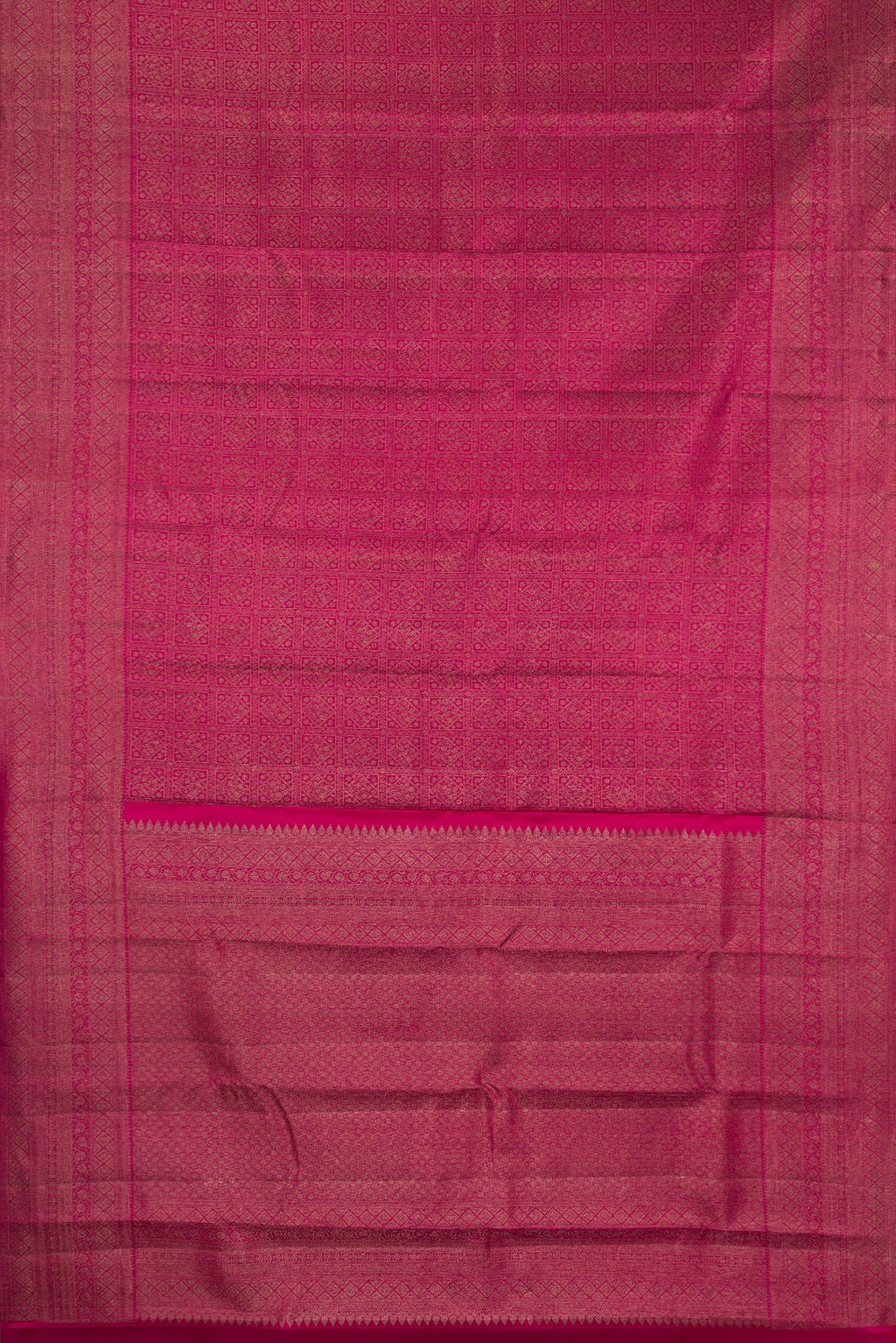 Flat view of Pure Silk Dark Pink Kanjivaram Saree with Zari Brocade on the body and Fancy Border. 