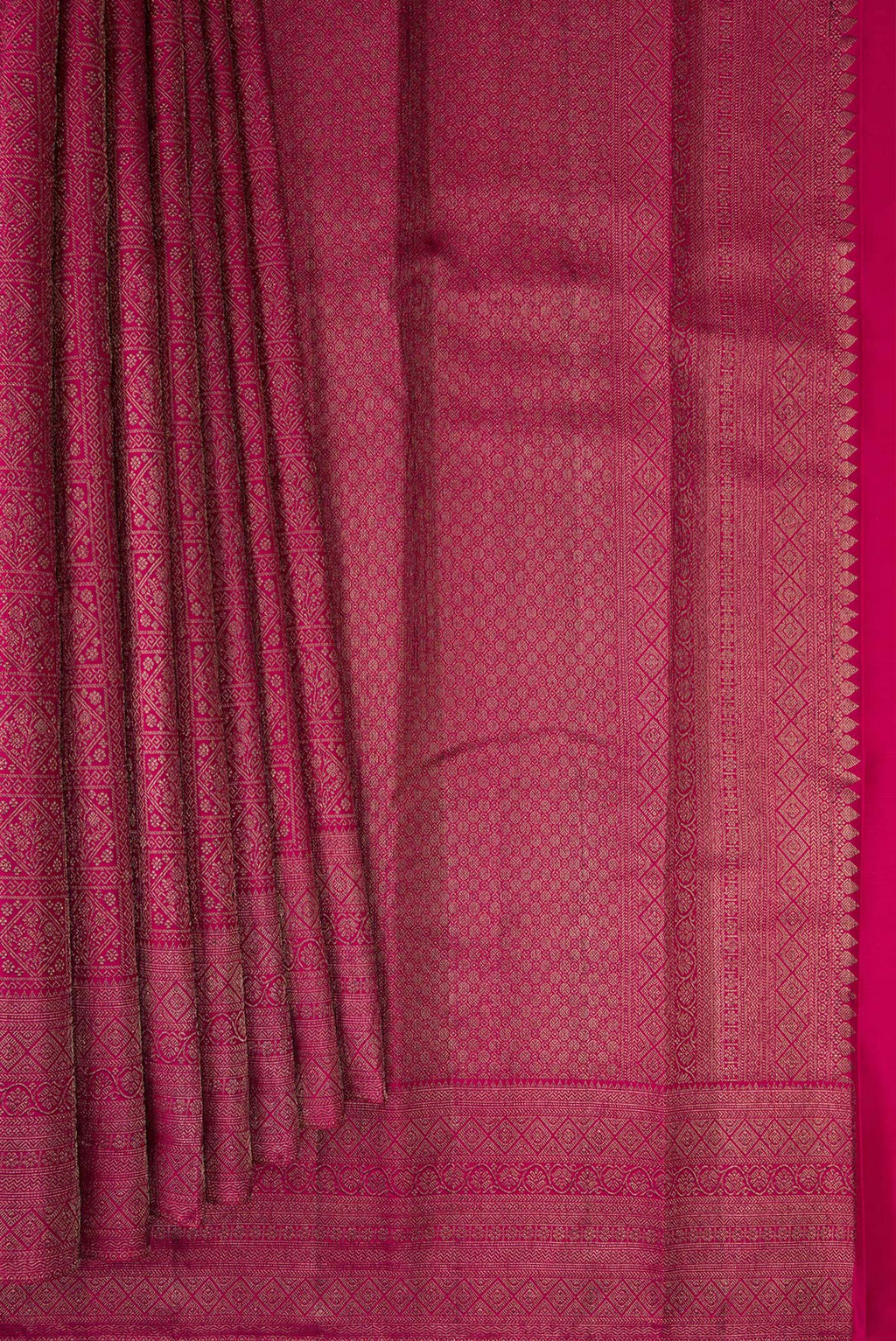 Pleats and pallu of Pure Silk Dark Pink Kanjivaram Saree with Zari Brocade on the body and Fancy Border. 